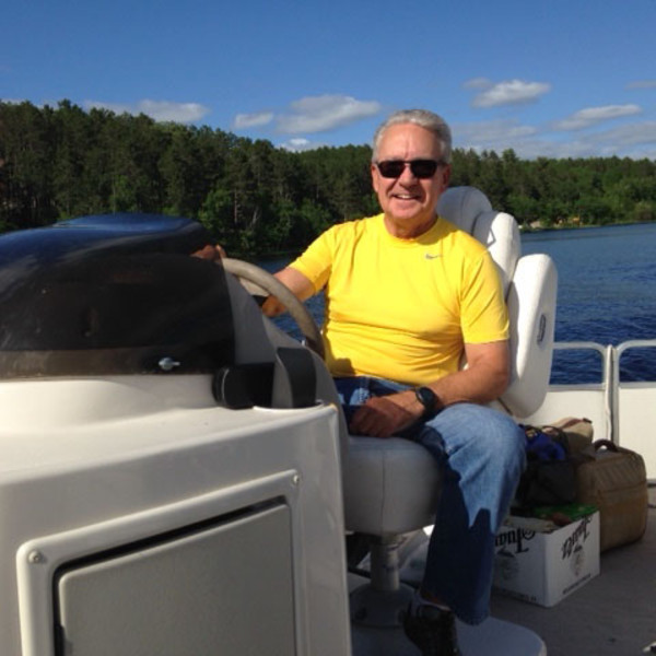 Larry Stelter driving his boat